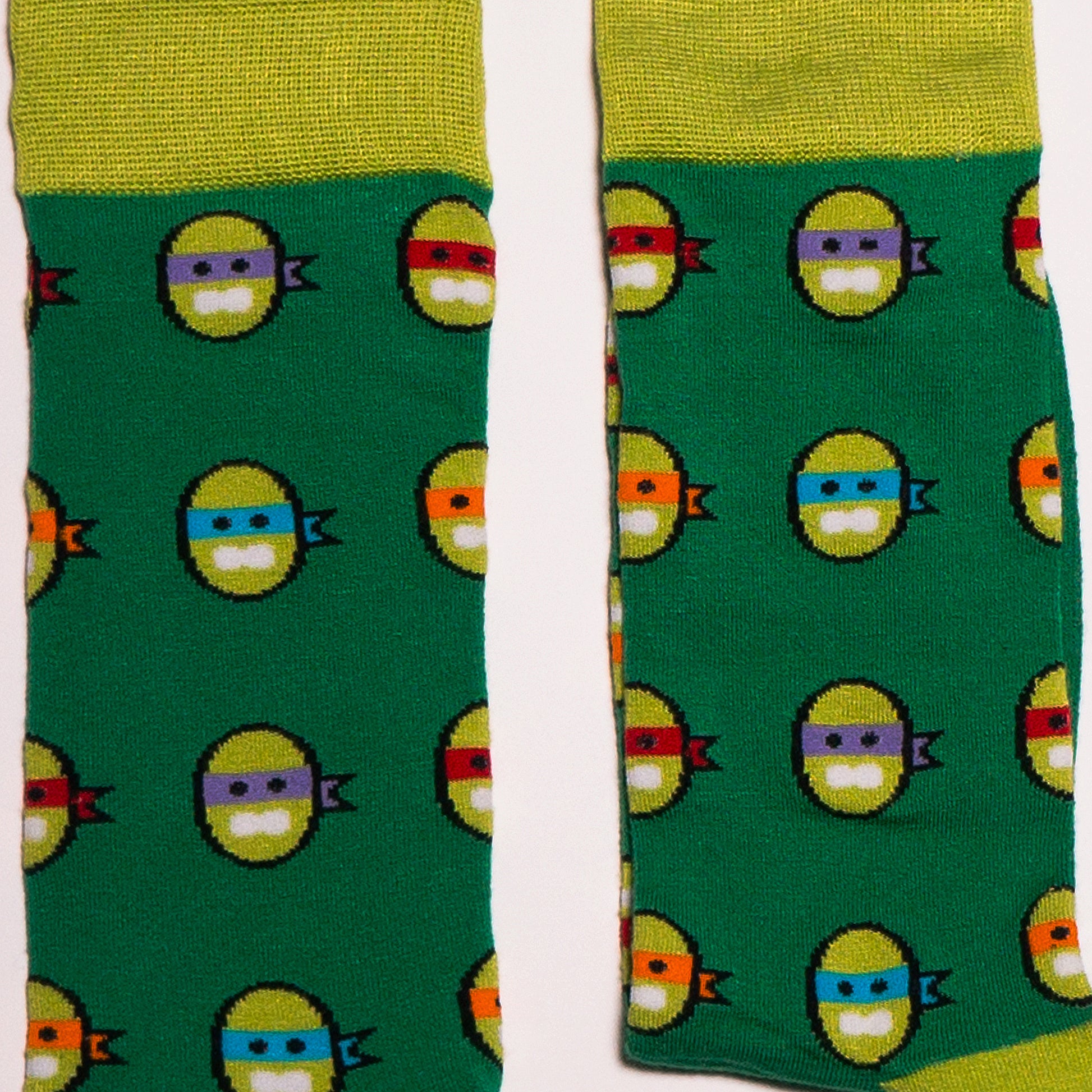 Turtle Power. A throwback to those afternoons spent in the retro video arcade. Or 1980s Saturday morning's spent watching the Ninja Turtles on TV. A collaboration with Andy Awesome, a Munich based 90's child who makes art out of the heroes of his childhood (and ours!). Available in US Men’s 4-8 and 8-12. Soft. Strong. Comfortable. Sustainable. Incredible Socks. Ninja Turtles Socks