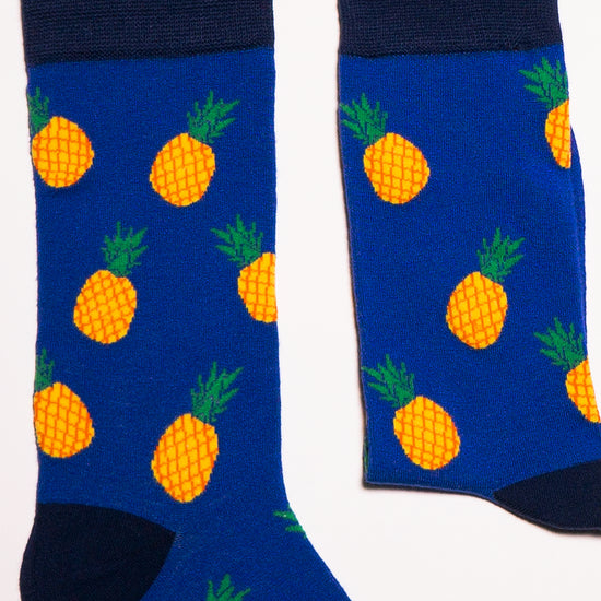 Pineapple Socks! Fruity. One in a series of five pairs of socks each representing your favorite fruits. Buy individually or as part of your 5-A DAY! Buy 4 in the collection and get your 5th fruity pair for FREE!  The 5-A-DAY collection consists of Banana-rama, Strawberry Surprise, Cherry On Top, Perfect Pineapples and Melon Deliciousness. Soft. Strong. Sustainable. Comfortable.  Available in US Men’s 4-8 and 8-12