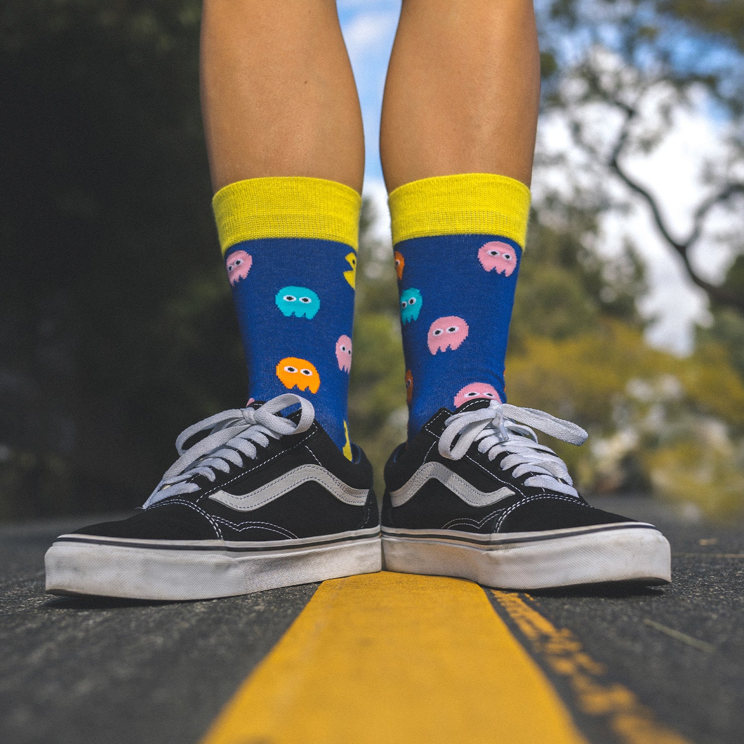 Who doesn't love the nostalgia of the 1980s retro, arcade games. What was your PacMan high score? Fun, comfortable socks that are a bold reminder of our misspent youth. An Incredible Socks collaboration with Andy Awesome, a Munich based 90's child who makes art out of the heroes of his childhood (and ours!). Soft. Strong. Comfortable. Sustainable. Shown here in the middle of a quiet street on a pair of feet. Available in US Men’s 4-8 and 8-12. Incredible Socks. Pac Man