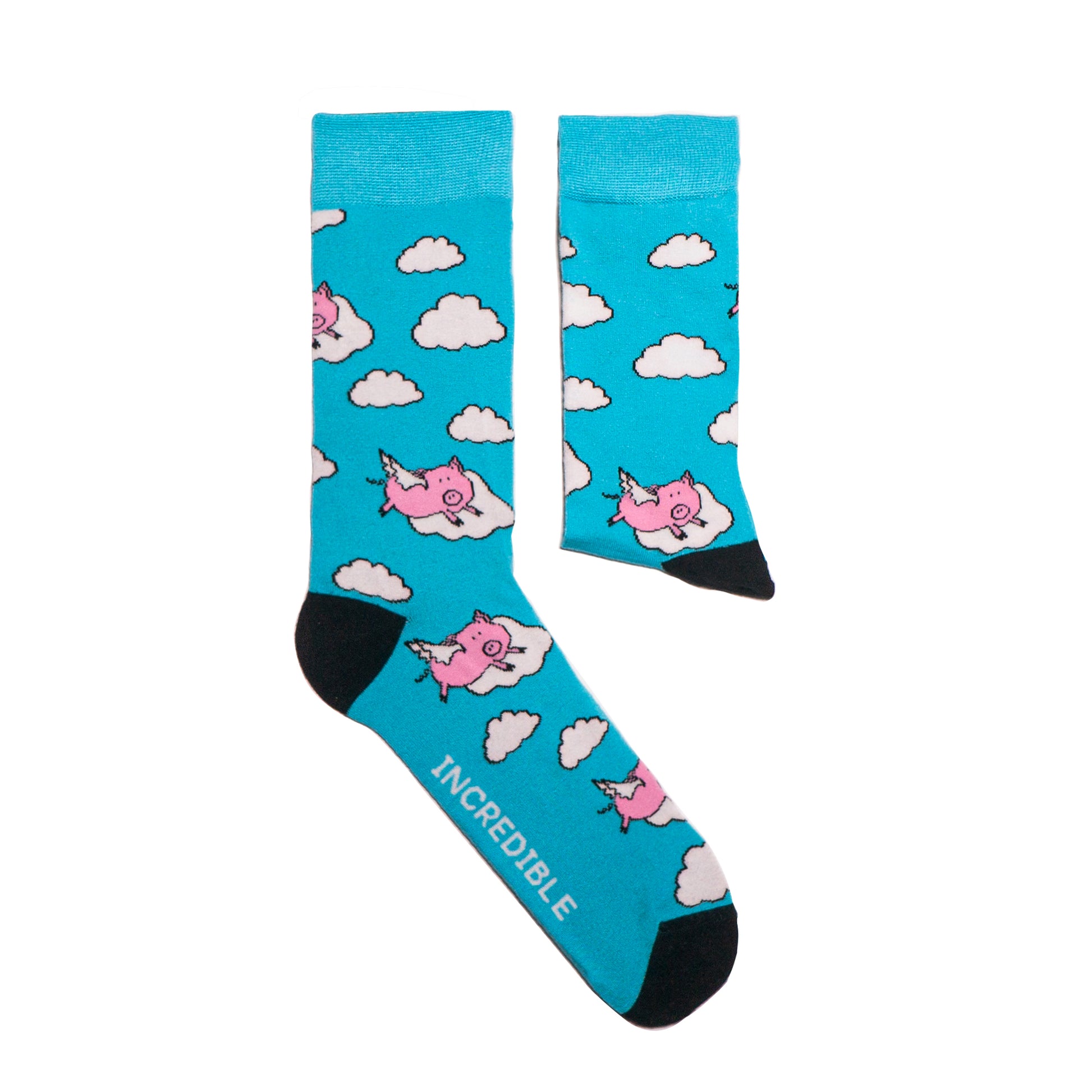 One of our most popular designs. The perfect shade of blue meets our lovable pink pigs - who said these guys could not fly! Soft. Strong. Sustainable. Comfortable.  Pigs! On Socks. We know! Madness.  Available in US Men’s 4-8 and 8-12