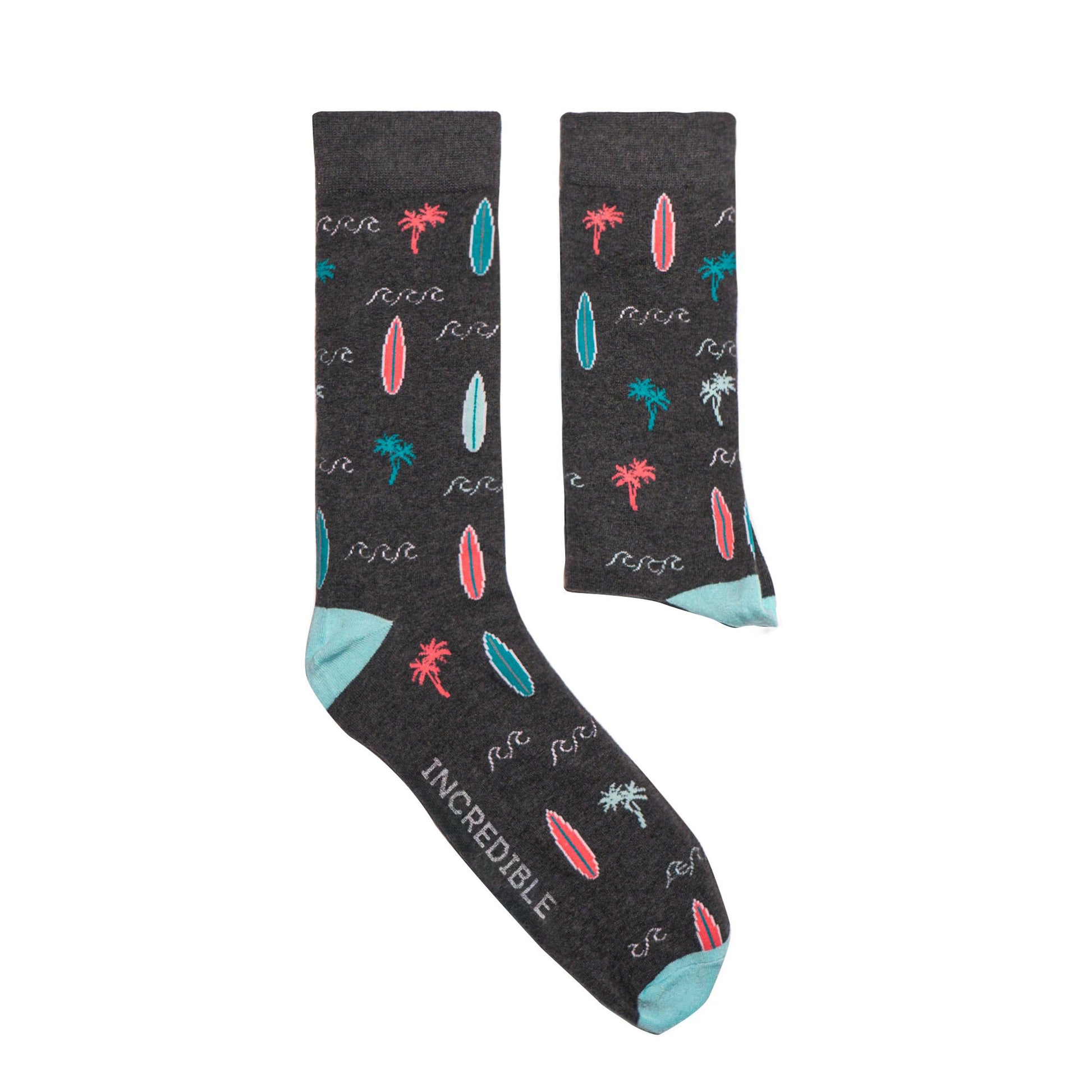 Surf boards, the best waves and beautiful palm trees make for the perfect paradise pair of socks for summer.. or even winter. Bright and breezy pastels on a light grey base. Soft. Strong. Sustainable. Comfortable.  Available in US Men’s 4-8 and 8-12