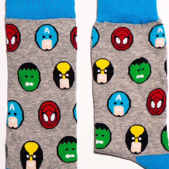 All superheroes wear Incredible Socks! All your favorite action heroes on one pair of feet. Is that SpiderMan, The Hulk, Captain America and Iron Man? Maybe. Maybe not. A collaboration with Andy Awesome, a Munich based 90's child who makes art out of the heroes of his childhood (and ours!) Soft. Strong. Sustainable. Comfortable.  Available in US Men’s 4-8 and 8-12. Spider Man. The Incredible Hulk, Iron Man. Captain America. Spiderman 