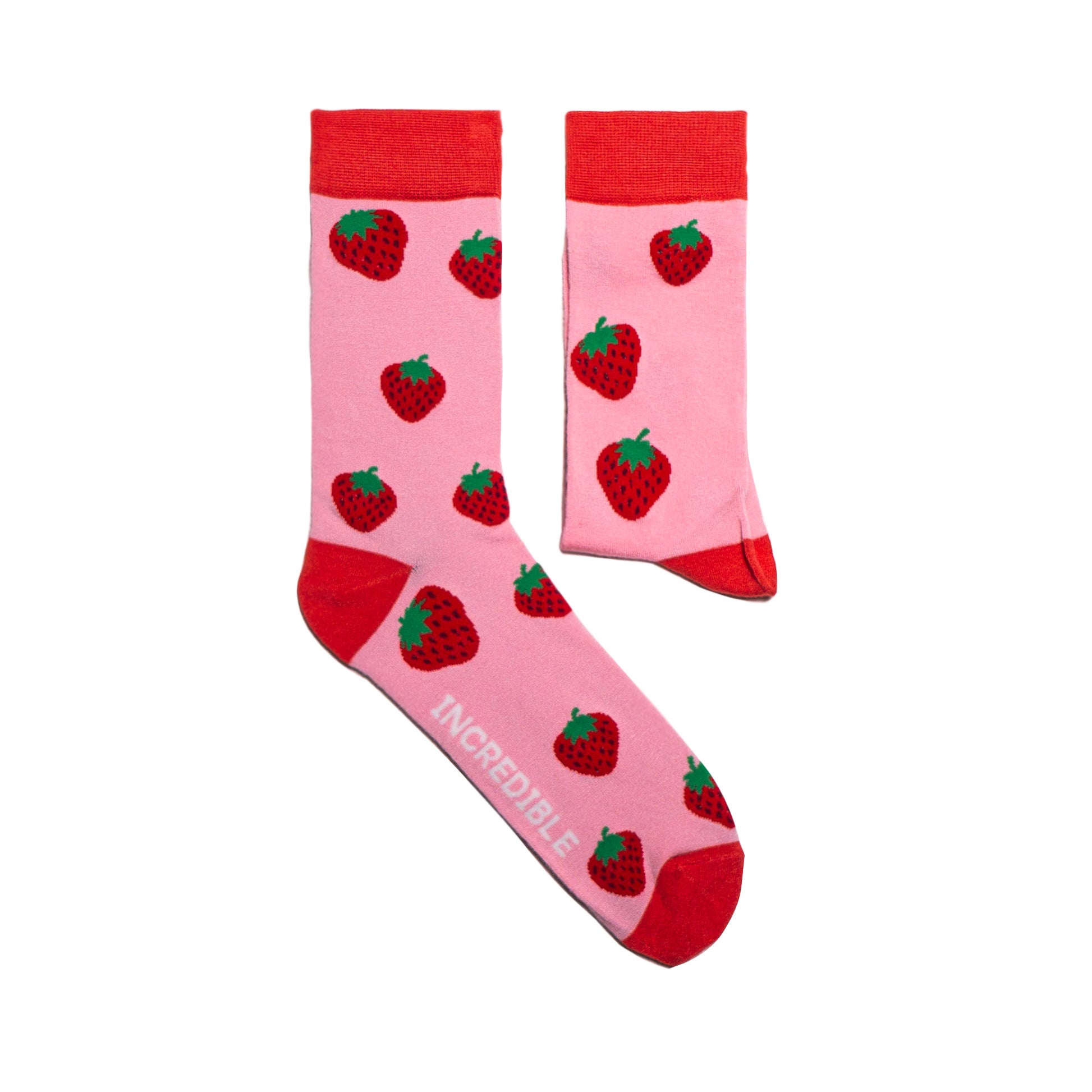 Strawberry Socks! Fruity. One in a series of five pairs of socks each representing your favorite fruits. Buy individually or as part of your 5-A DAY! Buy 4 in the collection and get your 5th fruity pair for FREE! Yum - strawberries.  The 5-A-DAY collection consists of Banana-rama, Strawberry Surprise, Cherry On Top, Perfect Pineapples and Melon Deliciousness. Soft. Strong. Sustainable. Comfortable.   Available in US Men’s 4-8 and 8-12