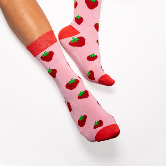 Strawberry Socks! Fruity. One in a series of five pairs of socks each representing your favorite fruits. Buy individually or as part of your 5-A DAY! Buy 4 in the collection and get your 5th fruity pair for FREE! Yum - strawberries.  The 5-A-DAY collection consists of Banana-rama, Strawberry Surprise, Cherry On Top, Perfect Pineapples and Melon Deliciousness. Soft. Strong. Sustainable. Comfortable.   Available in US Men’s 4-8 and 8-12