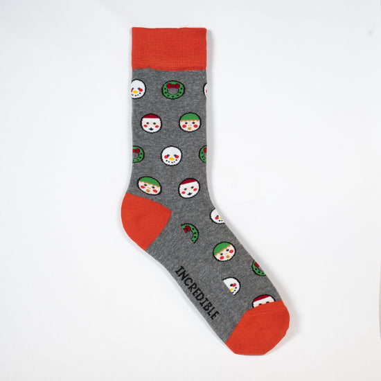 Holiday inspired christmas socks with elves, cake, snow globes and santa claus. made from bamboo